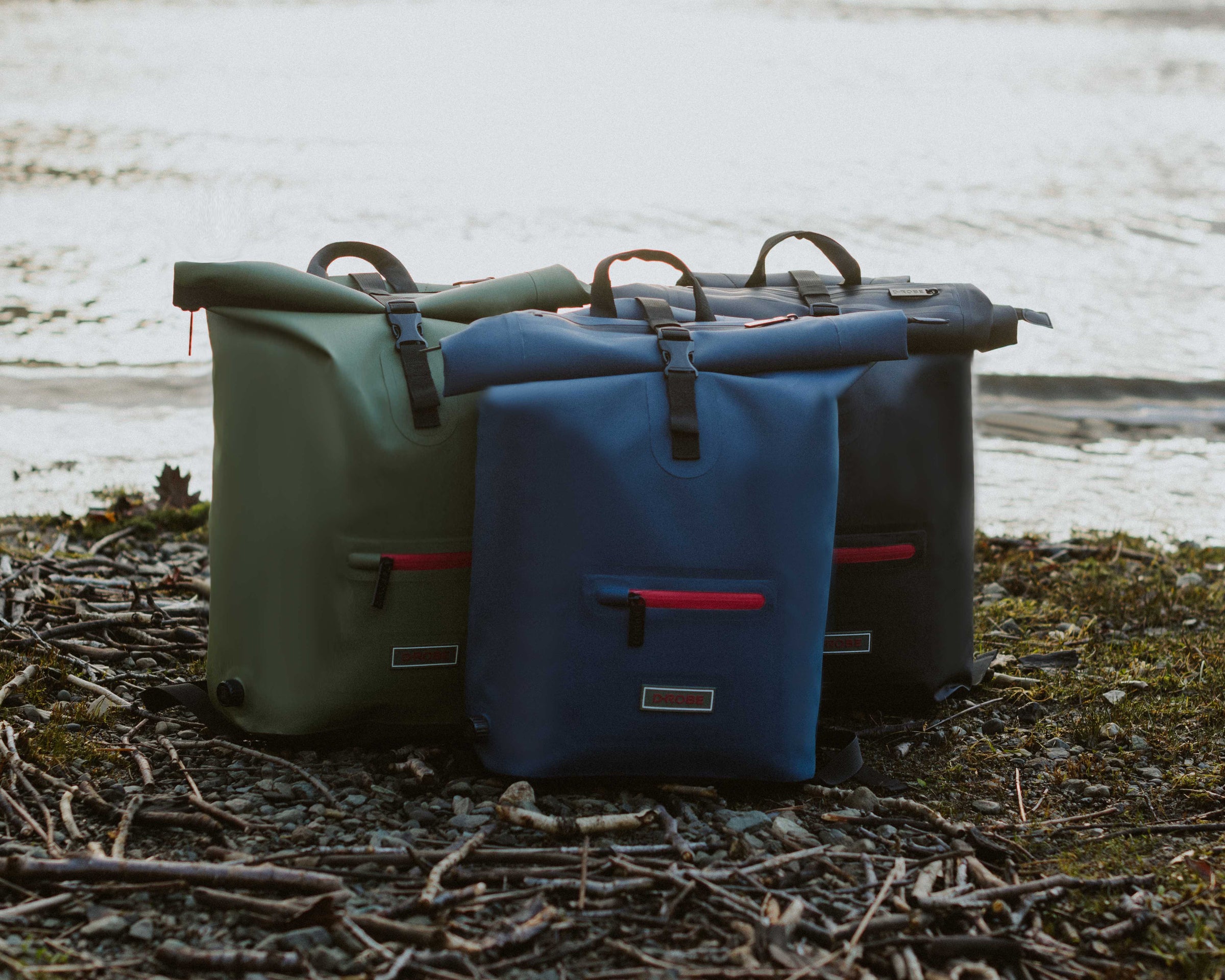 Waterproof backpack rucksack in green, navy, and black